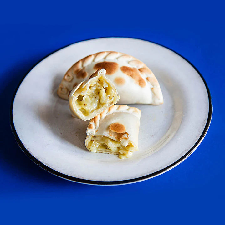 Empanadas Artesanales de Cebolla y Queso - Che Tomi